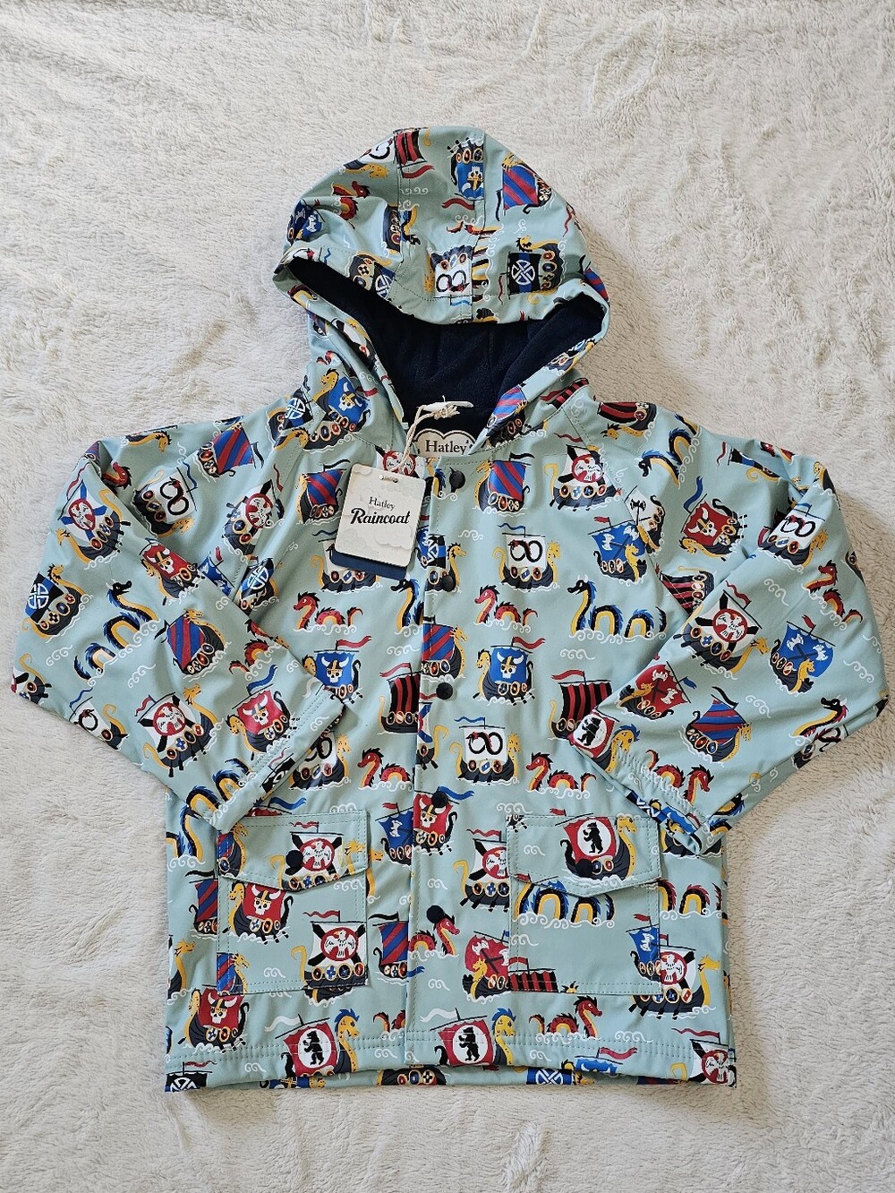 Hatley Light Blue Kids' Hooded Raincoat with Pirate Ship & Sea Creature Print